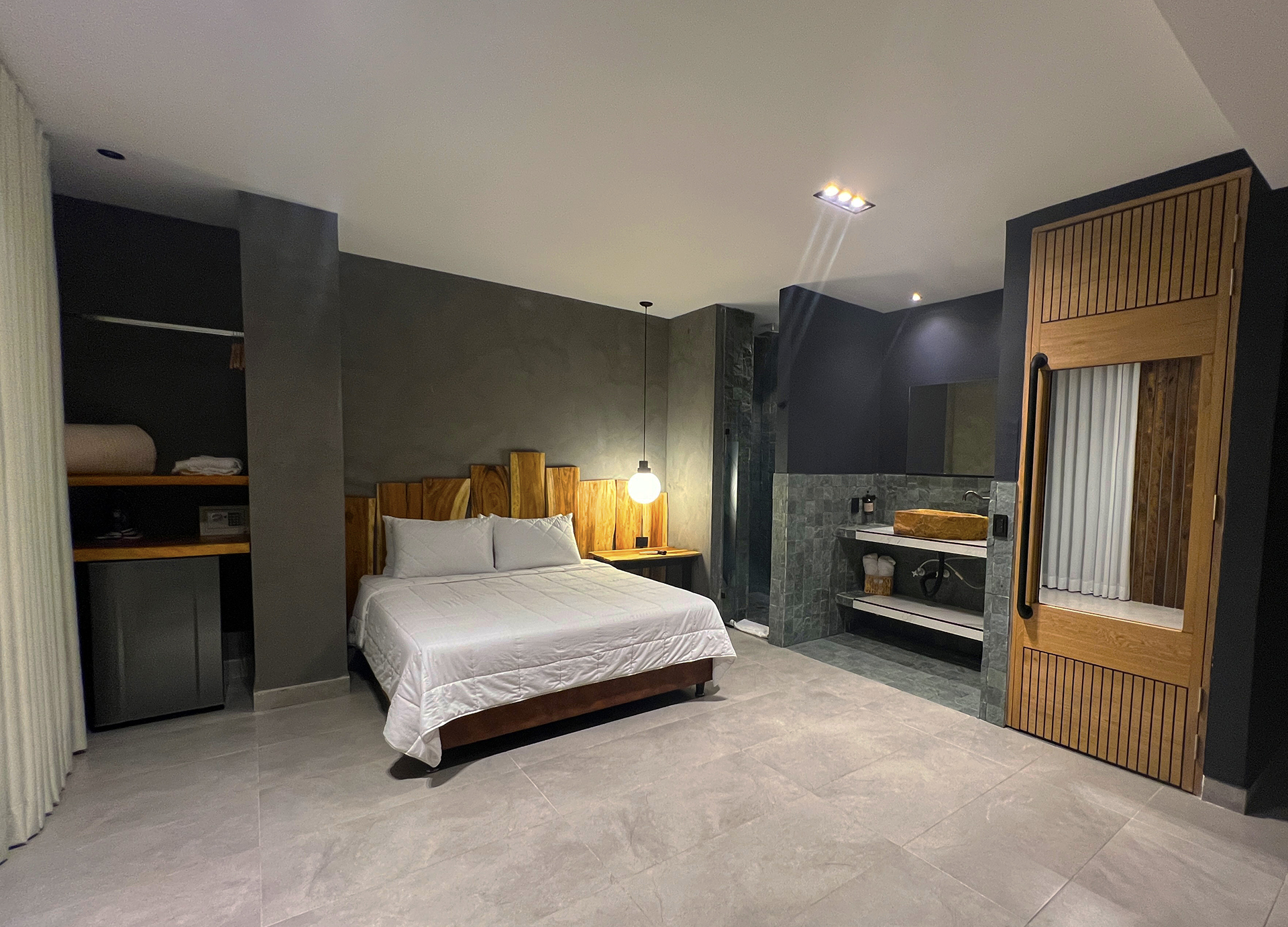 diseño elegante con todas las comodidades habitacion sencilla zelva negra hotel medellin